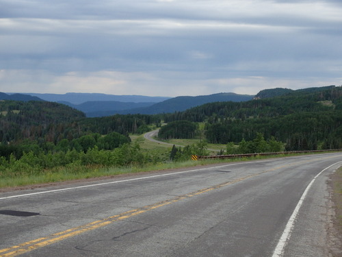 GDMBR: Coasting downhill on CO-17 (too cool to pedal).